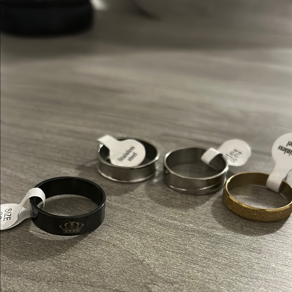 Men's Black, Silver, and Gold Rings Set
